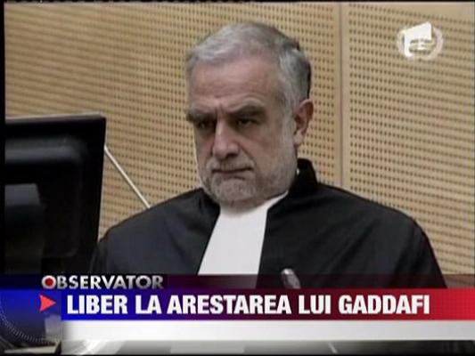Mandat international de arestare pe numele lui Muammar Gaddafi ‎