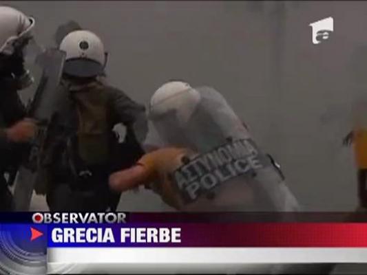 Grecia a votat planul de austeritate, violentele continua la Atena ‎