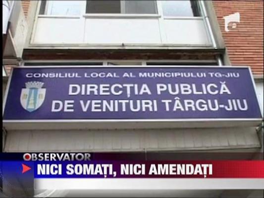 Scapati de amenzi din cauza crizei