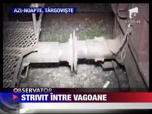 Strivit intre doua vagoane de tren