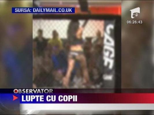 Lupte cu copii in ringuri asemanatoare unor custi
