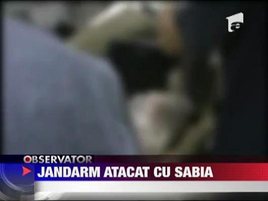 Jandarm atacat cu sabia in fata blocului, in Pascani