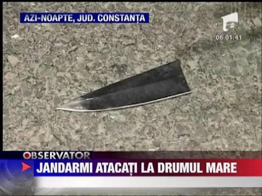 Jandarmi atacati cu sabii in trafic