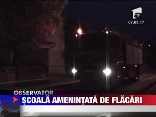 Scoala amenintata de flacari