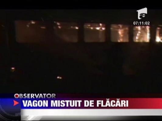 Vagon mistuit de flacari