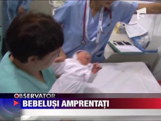 Bebelusi amprentati la nastere