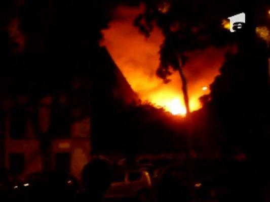 Depozit in flacari la Paris: Zeci de imigranti romani, salvati