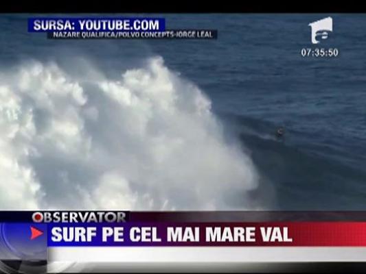 Un surfer american a intrat in istorie dupa ce a "navigat" pe cel mai inalt val