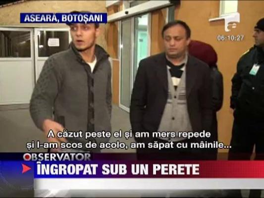 Ingropat sub un perete