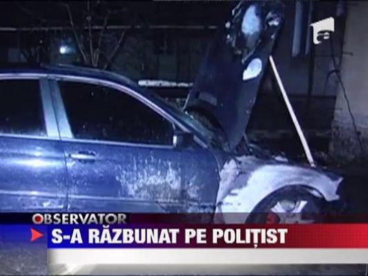 A incendiat masina unui politist