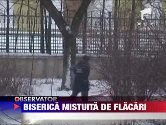 Biserica mistuita de flacari