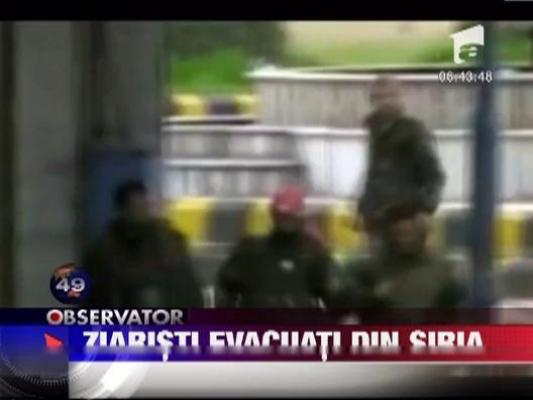 Ziaristi evacuati din Siria