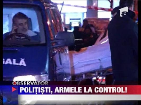 Politistii detinatori de arme, la control