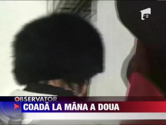 Imbulzeala in fata unui magazin cu produse la mana a doua