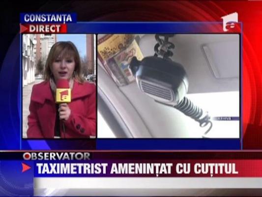 Taximetrist amenintat cu cutitul