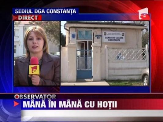 Politisti, mana in mana cu hotii