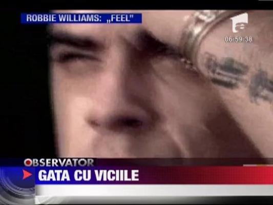 Robbie Williams vrea sa renunte la fumat