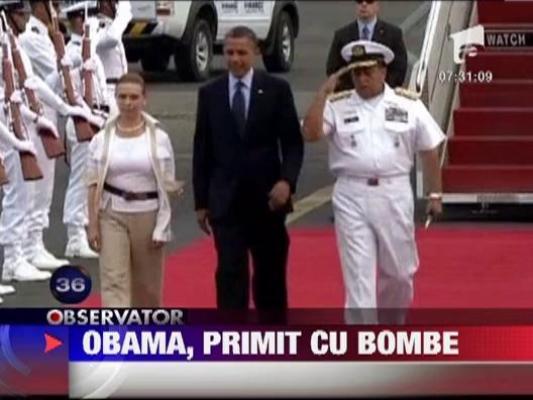 Barack Obama, primit cu bombe