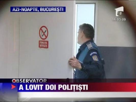 Un sofer a calcat doi politisti, intentionat