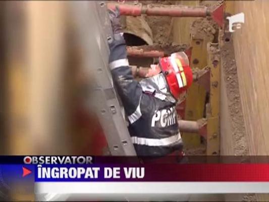 Muncitor ingropat de viu