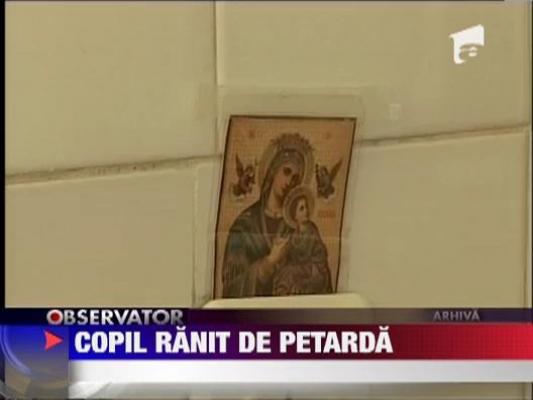 Copil de 8 ani, mutilat de o petarda militara