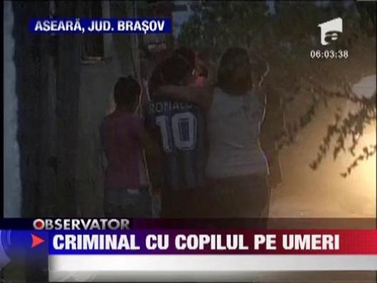 Si-a ucis concubina cu toporul, apoi a marsaluit cu copilul pe umeri in cautarea de noi victime!