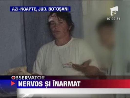 I-a tinut la distanta pe medici si pe politisti cu un topor