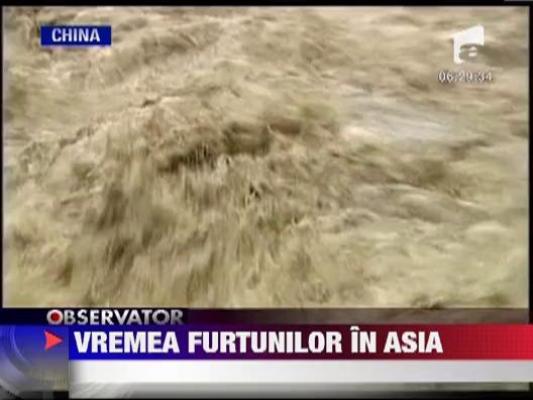 Furtunile si inundatiile fac ravagii in Asia: 32 de morti si cinci disparuti