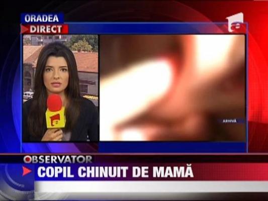 Copil chinuit de mama