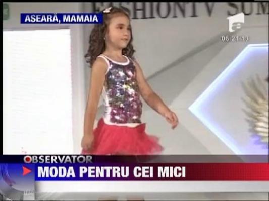 Defilare de moda inedita. Mai multi copii au prezentat haine din colectiile primavara-vara ale anului 2013