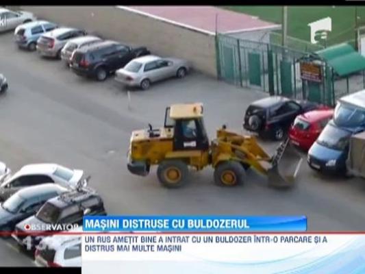 Luat la bataie dupa ce a intrat cu buldozerul in masinile dintr-o parcare