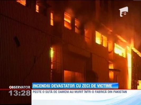 Incendiu de proportii la o uzina din Pakistan: 166 de morti