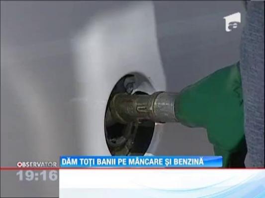 Romanii isi dau aproape tot salariul pe mancare si pe benzina!