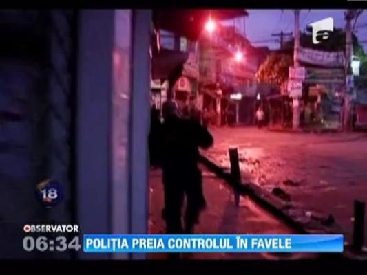 Politia braziliana a preluat controlul in doua dintre cele mai violente cartiere din Rio de Janeiro