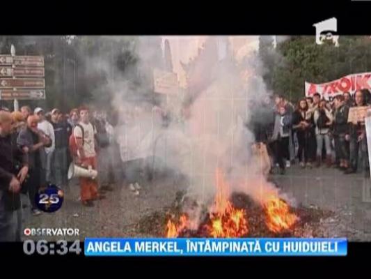 Angela Merkel a fost intampinata cu huiduieli in Portugalia