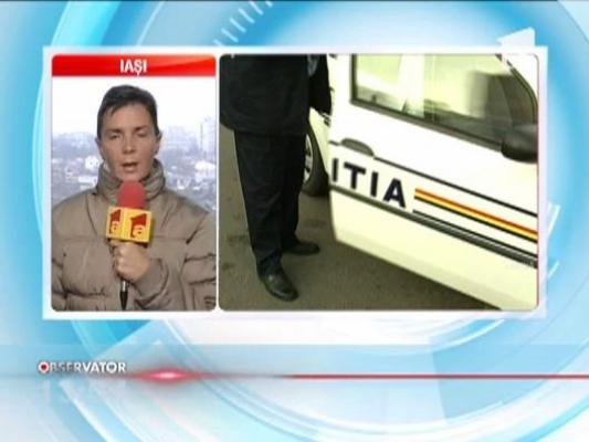Un barbat suspectat de crima a fugit din masina politiei