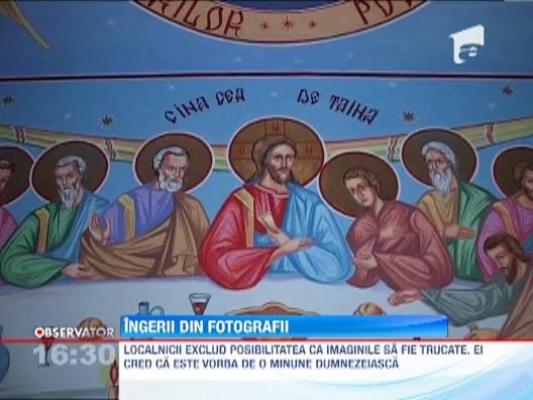 Chipuri de ingeri, pe peretii unei biserici din judetul Arges