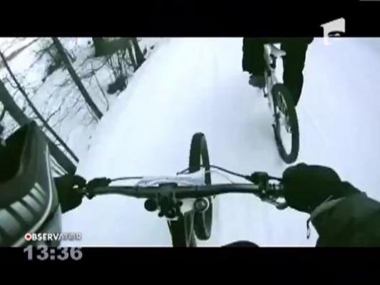 Cu bicicleta pe partie