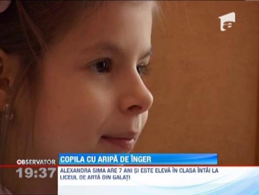 Copila cu aripa de inger!  Alexandra Sima are 7 ani si canta la pian cu o singura mana