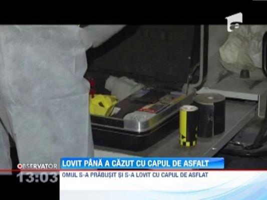 Lovit pana a cazut cu capul de asfalt