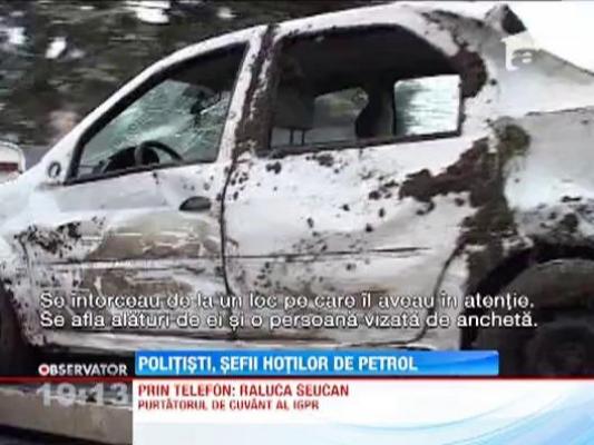 Politisti, sefii hotilor de petrol