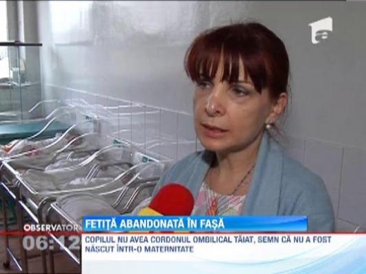 O fetita a fost abandonata in fasa, intr-un bloc bucurestean