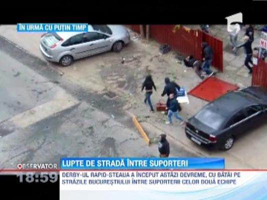 IMAGINI SOCANTE! Lupte de strada intre zeci de suporteri stelisti si rapidisti