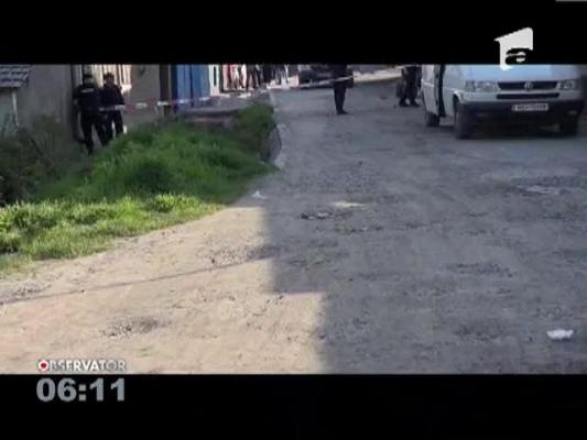 Reglare de conturi cu focuri de arma intre doua familii