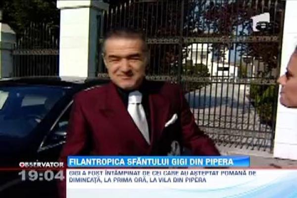 Gigi Becali a impartit sute de lei de ziua lui