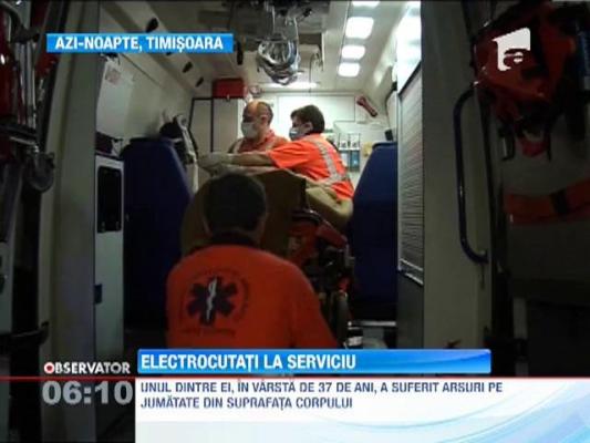 Doi muncitori, electrocutati in timp ce lucrau la reabilitarea unui drum