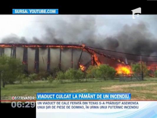 Viaduct culcat la pamant de un incendiu