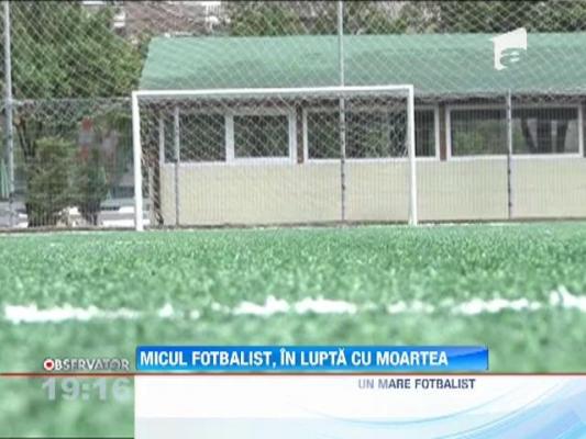 Copilul strivit de o poarta de fotbal e in coma profunda