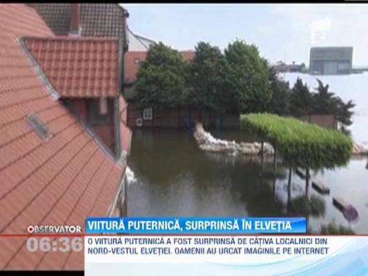 Imagini cutremuratoare cu viitura din Elvetia