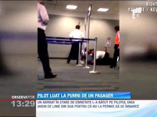 Pilot american luat la pumni de un pasager